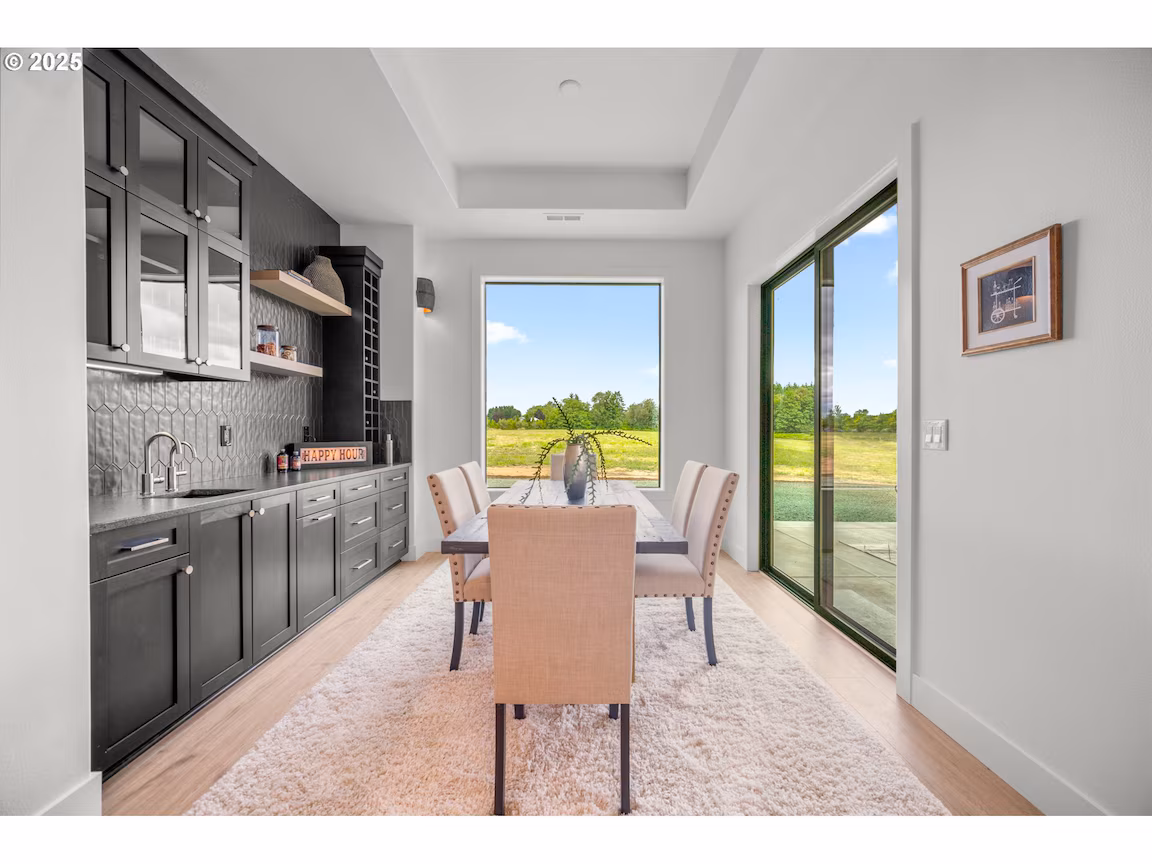 Modern kitchen with sleek design and outdoor views.