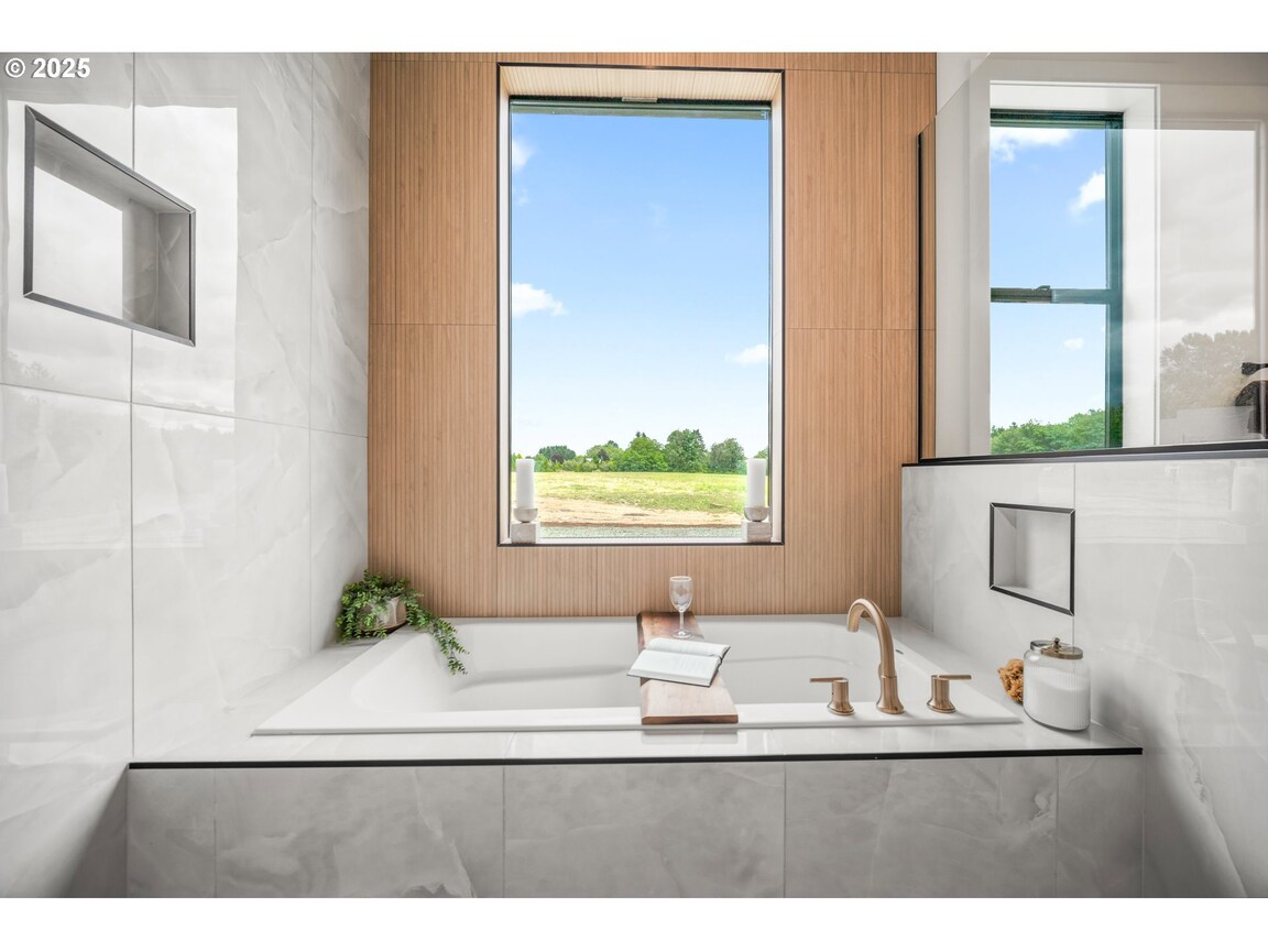 Modern kitchen window with a scenic outdoor view.