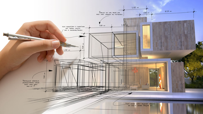Hand adjusting an architectural blueprint with a modern home model.