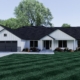 Modern white house with a black roof and green lawn.
